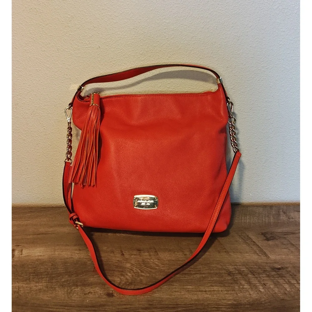 Michael Kors Hobo Crossbody Bag Womens Large Orange Pebbled Leather Tassel Gold